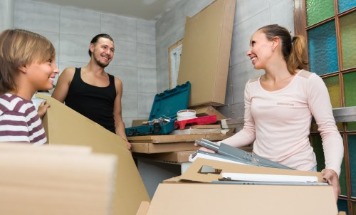 Same day removals team loading furniture in Roehampton