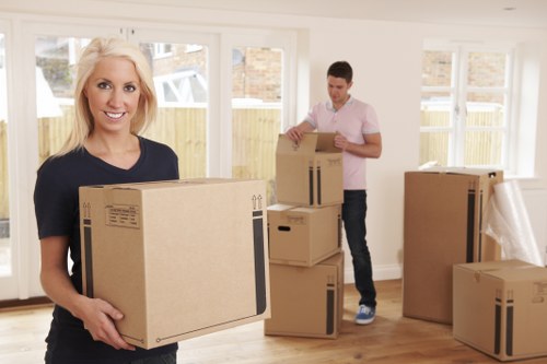 Packing and loading household items for a move in Roehampton