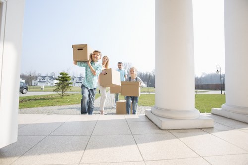 Trained movers using protective equipment during a relocation