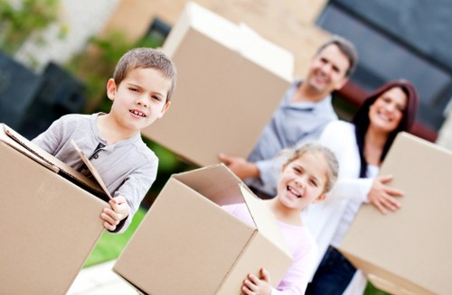 Professional moving team handling furniture in Roehampton
