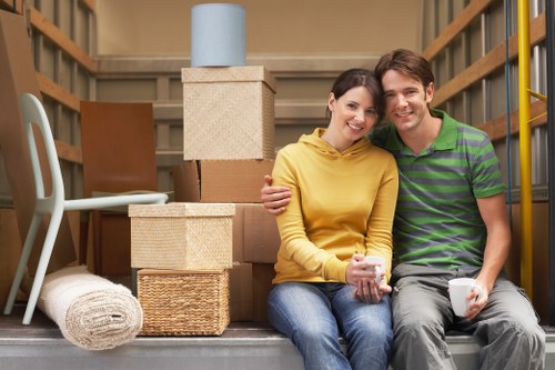 Professional movers handling furniture transport for a local Roehampton property