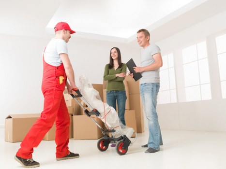 Packed boxes and furniture prepared for student removals in Roehampton